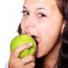 Woman Eating Apple